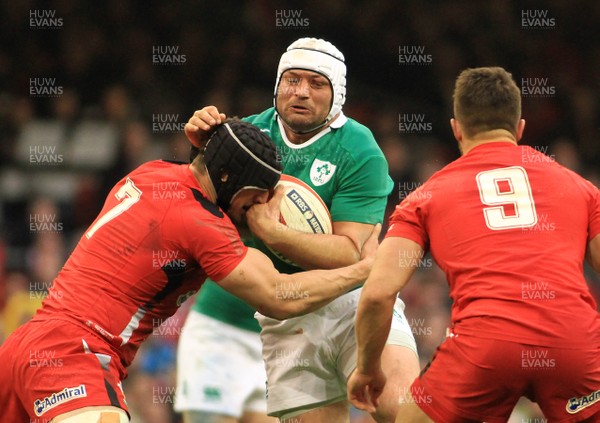 140315 - Wales v Ireland - RBS 6 Nations -Rory Best of Ireland is tackled by Sam Warburton of Wales