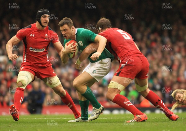 140315 - Wales v Ireland - RBS 6 Nations -Tommy Bowe of Ireland is tackled by Alun Wyn Jones of Wales