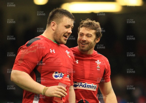 140315 - Wales v Ireland - RBS 6 Nations -Leigh Halfpenny(R) and Rob Evans of Wales celebrate after the game