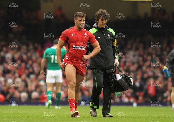 140315 - Wales v Ireland - RBS 6 Nations -Rhys Webb of Wales receives treatment