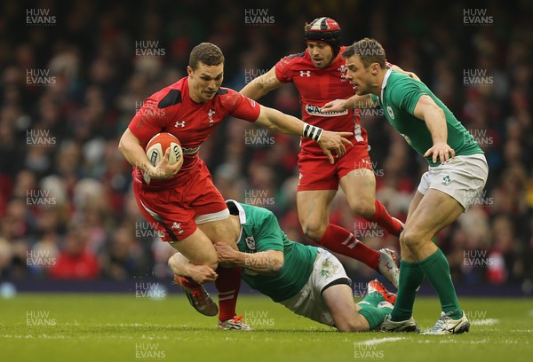 140315 - Wales v Ireland, RBS 6 Nations 2015 - George North of Wales is tackled by Jonny Sexton of Ireland