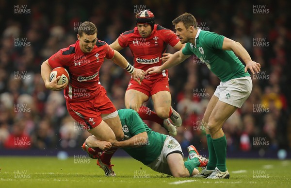 140315 - Wales v Ireland, RBS 6 Nations 2015 - George North of Wales is tackled by Jonny Sexton of Ireland