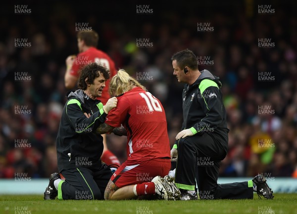 140315 - Wales v Ireland - RBS Six Nations - Richard Hibbard of Wales is treated by physio Mark Davies and Dr Geoff Davies