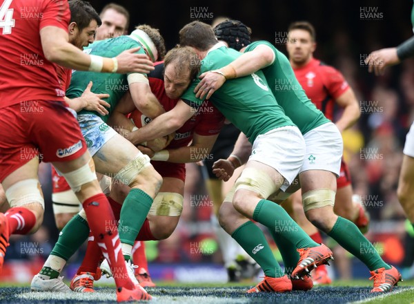 140315 - Wales v Ireland - RBS Six Nations - Alun Wyn Jones of Wales is tackled by Jamie Heaslip, Peter OÕMahony and Sean OÕBrien of Ireland