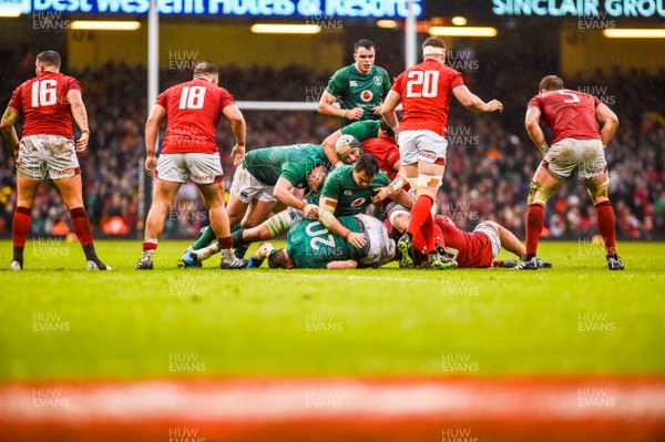 160319 - Wales v Ireland - Guinness Six Nations - Irish players try to recover the ball at the ruck
