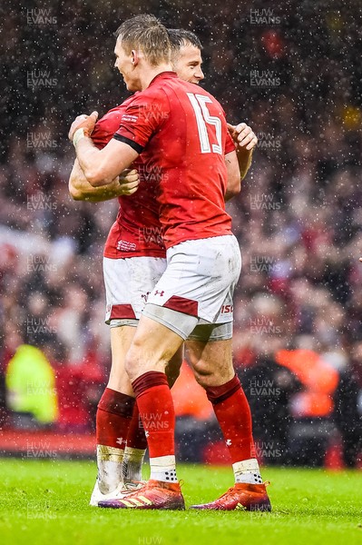 160319 - Wales v Ireland - Guinness Six Nations - Gareth Davies of Wales and Liam Williams of Wales celebrate 