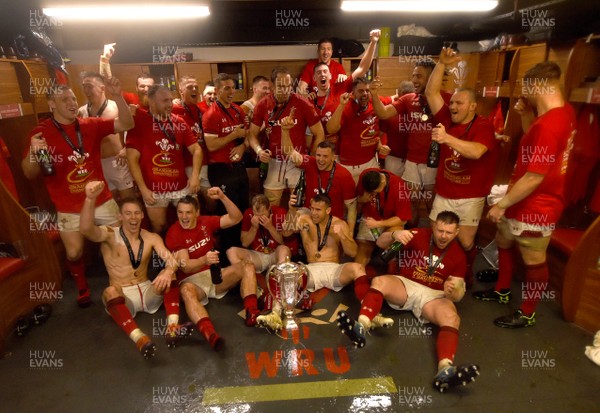 160319 - Wales v Ireland - Guinness Six Nations - Wales players celebrate in the dressing room