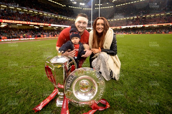 160319 - Wales v Ireland - Guinness Six Nations - Dan Biggar with son James and wife Alex