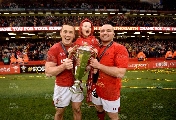 160319 - Wales v Ireland - Guinness Six Nations - Jonathan Davies with Ken Owens and his son Evan of Wales celebrates