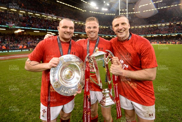 160319 - Wales v Ireland - Guinness Six Nations - Ken Owens, Gareth Anscombe and Hadleigh Parkes of Wales celebrates