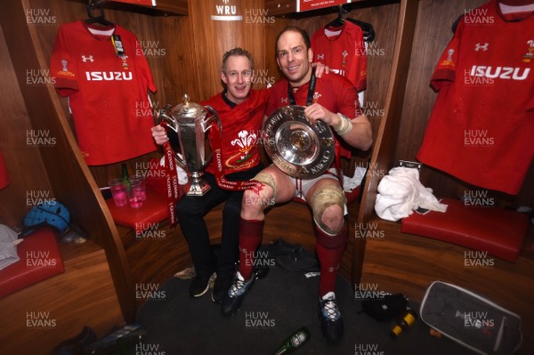 160319 - Wales v Ireland - Guinness Six Nations - Rob Howley and Alun Wyn Jones of Wales with the trophy in the dressing room