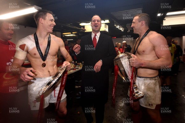 160319 - Wales v Ireland - Guinness Six Nations - Liam Williams and Hadleigh Parkes of Wales with Prince William with the trophy in the dressing room