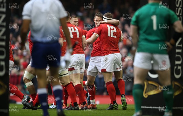160319 - Wales v Ireland - Guinness 6 Nations Championship - Hadleigh Parkes celebrates scoring a try with Liam Williams of Wales