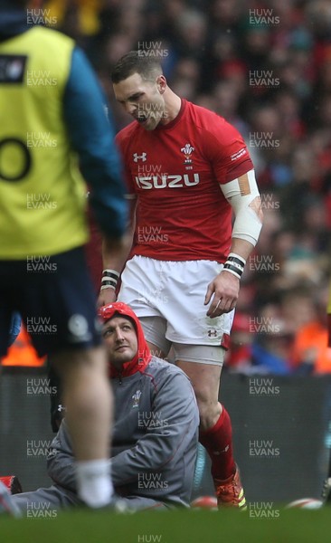 160319 - Wales v Ireland - Guinness 6 Nations Championship - George North of Wales goes off the field injured