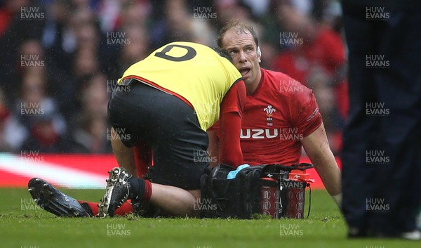 160319 - Wales v Ireland - Guinness 6 Nations Championship - Alun Wyn Jones of Wales is seen to by medics