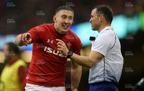 160319 - Wales v Ireland - Guinness 6 Nations Championship - Josh Adams of Wales has words with the linesman