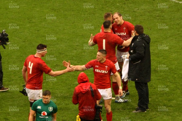 160319 - Wales v Ireland - Guinness Six Nations -  Players of Wales celebrate winning the 2019 Guinness 6 Nations at the final whistle 
