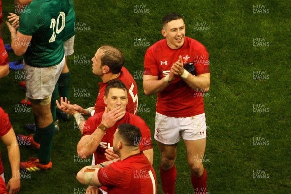 160319 - Wales v Ireland - Guinness Six Nations -  Players and backroom staff of Wales celebrate winning the 2019 Guinness 6 Nations at the final whistle 