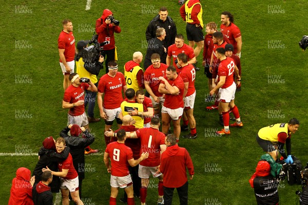 160319 - Wales v Ireland - Guinness Six Nations -  Players and backroom staff of Wales celebrate winning the 2019 Guinness 6 Nations at the final whistle 