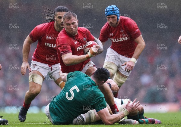 160319 - Wales v Ireland, Guinness Six Nations Championship 2019 - Ross Moriarty of Wales is tackled by James Ryan of Ireland