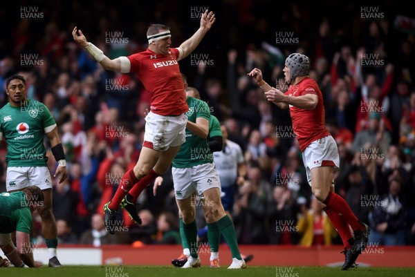 160319 - Wales v Ireland - Guinness Six Nations -  Hadleigh Parkes of Wales celebrates scoring a try with Jonathan Davies 