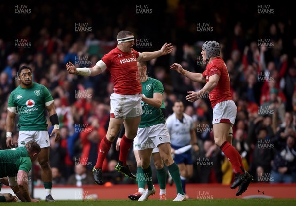 160319 - Wales v Ireland - Guinness Six Nations -  Hadleigh Parkes of Wales celebrates scoring a try with Jonathan Davies 