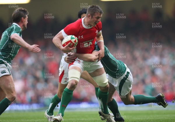 21.03.09 - Wales v Ireland, RBS 6 Nations 2009. -  Wales' Dafydd Jones is held 