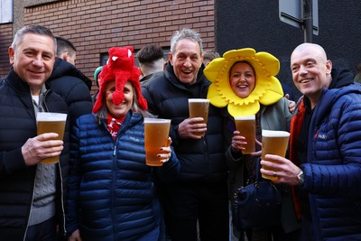 220225 - Wales v Ireland - Guinness Six Nations - Fans pose for a photo prior to the game