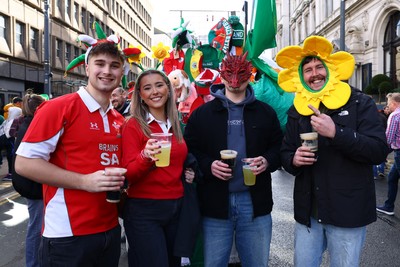 220225 - Wales v Ireland - Guinness Six Nations - Fans pose for a photo prior to the game