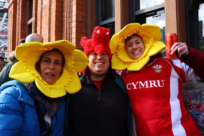 220225 - Wales v Ireland - Guinness Six Nations - Fans pose for a photo prior to the game