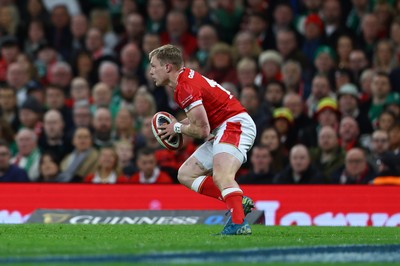 220225 - Wales v Ireland - Guinness Six Nations - Blair Murray of Wales runs with the ball