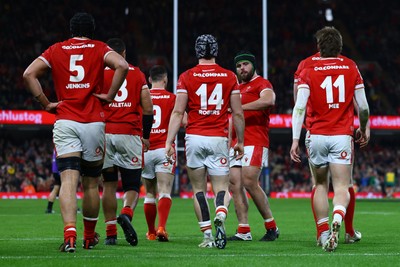 220225 - Wales v Ireland - Guinness Six Nations - Tom Rogers of Wales celebrates with teammate Nicky Smith after scoring the team's second try