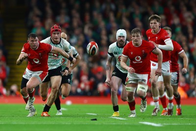 220225 - Wales v Ireland - Guinness Six Nations - Elliot Dee of Wales and Jac Morgan of Wales look for the ball