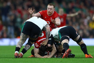 220225 - Wales v Ireland - Guinness Six Nations - Tommy Reffell of Wales tackles