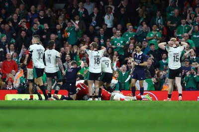 220225 - Wales v Ireland - Guinness Six Nations - Finlay Bealham and Jamie Osborne of Ireland react as an Ireland try is not given