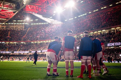 220225 - Wales v Ireland - Guinness Six Nations -  Wales players warm up ahead of the second half