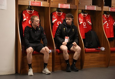 220225 - Wales v Ireland - Guinness 6 Nations Championship - Blair Murray and Tom Rogers of Wales in the dressing room before the game