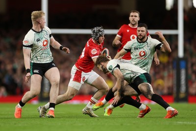 220225 - Wales v Ireland - Guinness 6 Nations Championship - Tom Rogers of Wales wins the high ball