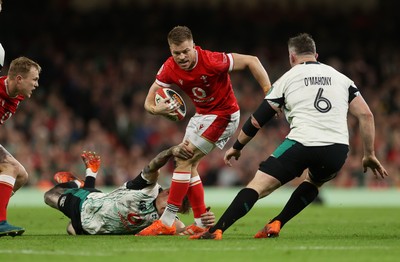 220225 - Wales v Ireland - Guinness 6 Nations Championship - Gareth Anscombe of Wales is tackled by Garry Ringrose of Ireland 