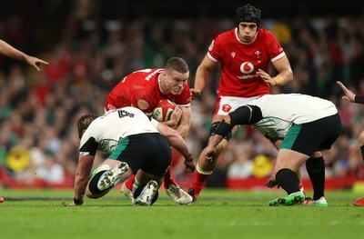 220225 - Wales v Ireland - Guinness 6 Nations Championship - Will Rowlands of Wales is tackled by Joe McCarthy of Ireland 