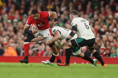 220225 - Wales v Ireland - Guinness 6 Nations Championship - Taulupe Faletau of Wales is tackled by Jack Conan of Ireland 