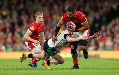 220225 - Wales v Ireland - Guinness 6 Nations Championship - Taulupe Faletau of Wales is tackled by Joe McCarthy of Ireland 