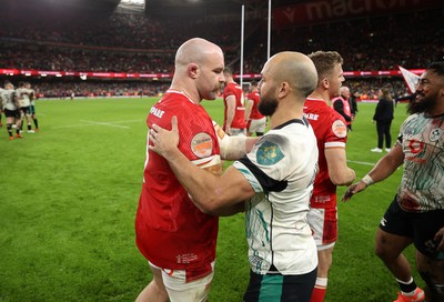 220225 - Wales v Ireland - Guinness 6 Nations Championship - WillGriff John of Wales and Jamison Gibson-Park of Ireland at full time