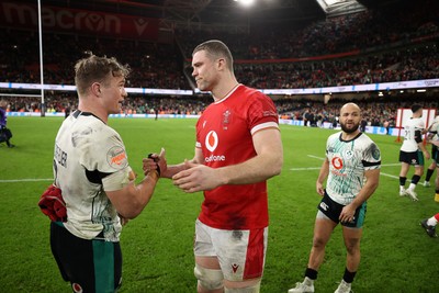 220225 - Wales v Ireland - Guinness 6 Nations Championship - Josh van der Flier of Ireland and Will Rowlands of Wales at full time