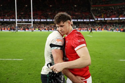 220225 - Wales v Ireland - Guinness 6 Nations Championship - James Lowe of Ireland and Tom Rogers of Wales at full time