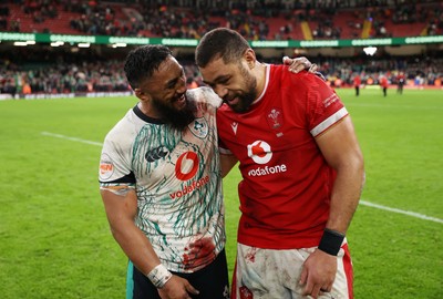 220225 - Wales v Ireland - Guinness 6 Nations Championship - Bundee Aki of Ireland and Taulupe Faletau of Wales at full time