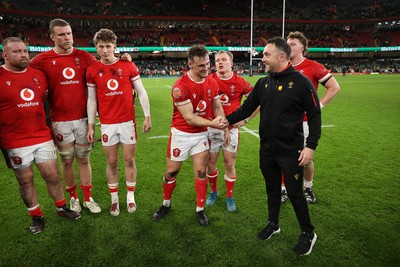 220225 - Wales v Ireland - Guinness 6 Nations Championship - Wales Interim Head Coach Matt Sherratt and Jarrod Evans of Wales at full time