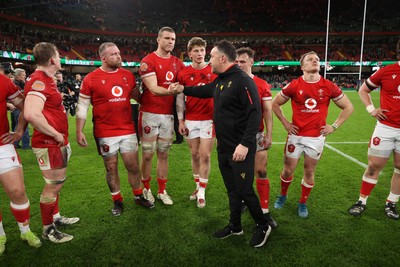 220225 - Wales v Ireland - Guinness 6 Nations Championship - Will Rowlands of Wales and Wales Interim Head Coach Matt Sherratt at full time