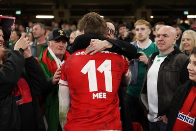 220225 - Wales v Ireland - Guinness 6 Nations Championship - Ellis Mee of Wales with family after the game