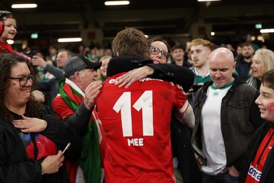 220225 - Wales v Ireland - Guinness 6 Nations Championship - Ellis Mee of Wales with family after the game